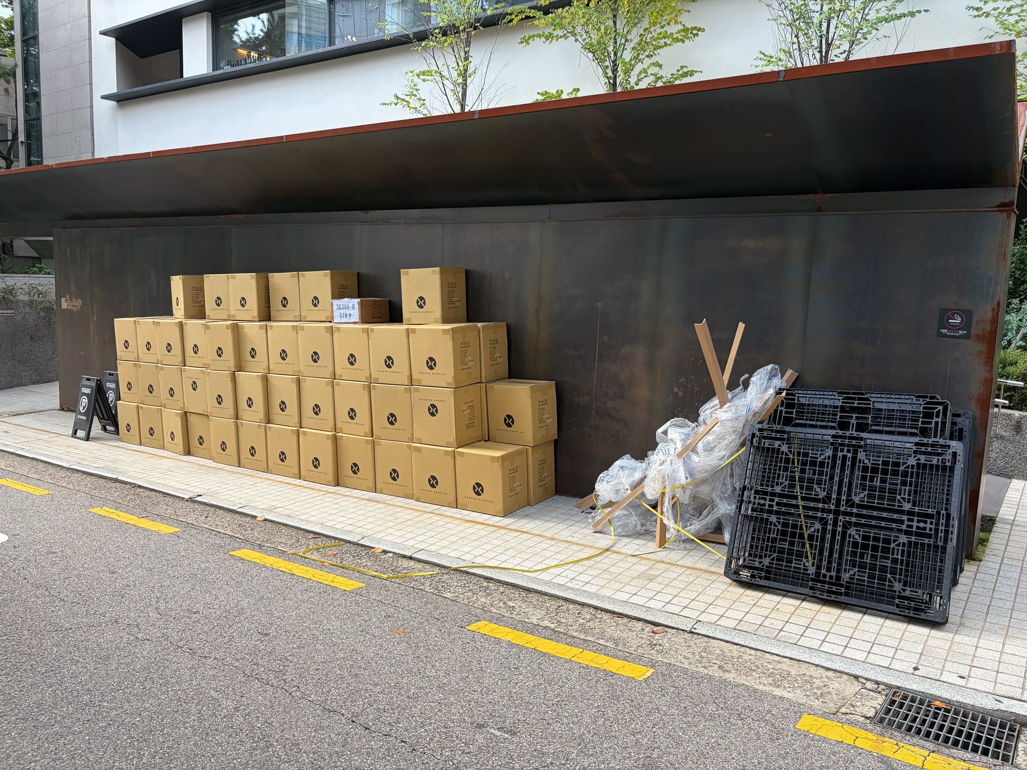 Cartons of sensors stacked outside the Seoul office