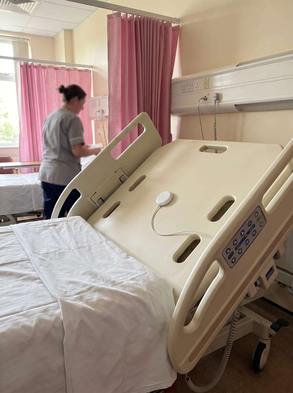 A ward bed, raised, with the sensor